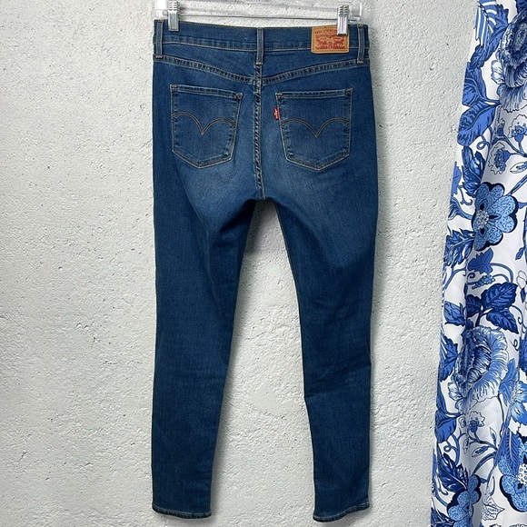 Levi’s 311 Shaping Skinny Medium Wash Stretchy Jeans Mid Rise Slimming Size 27 - Picture 4 of 9
